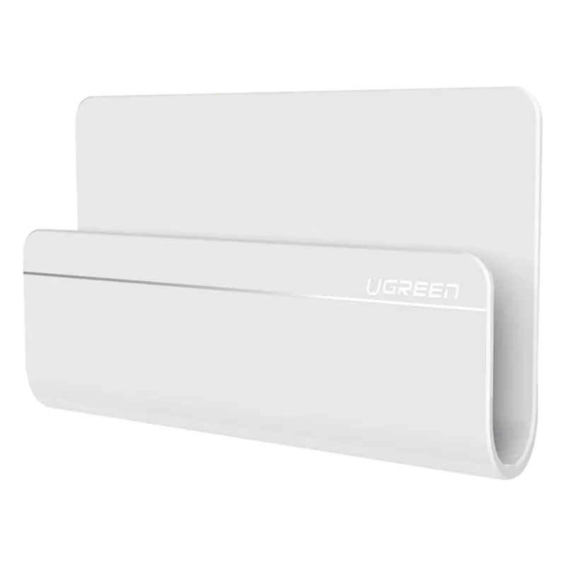 Soporte de Pared Adhesivo para Teléfono / Diseño de Montaje en Pared / Protección De Silicona Antideslizante / Anti Arañazos / Adhesivo 3M / Soporta Dispositivos 165*81*26.5 mm. / Caja De ABS / Color Blanco UGREEN 30394